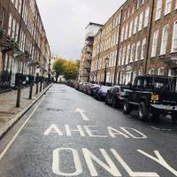 Walk along Bedford Row to reach Theobolds Road, then cross over it and continue straight along Great James Street.